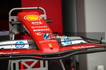 2024-09-19 - Scuderia Ferrari SF-24, mechanical detail front wing mechanic, mecanicien, mechanics during the Formula 1 Singapore Grand Prix 2024, 18th round of the 2024 Formula One World Championship from September 20 to 22, 2024 on the Marina Bay Circuit, in Singapore, Singapore - F1 - SINGAPORE GRAND PRIX 2024 - FORMULA 1 - MOTORS