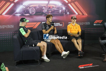 2024-09-19 - RUSSELL George (gbr), Mercedes AMG F1 Team W15, portrait BOTTAS Valtteri (fin), Stake F1 Team Kick Sauber C44, portrait PIASTRI Oscar (aus), McLaren F1 Team MCL38, portrait press conference during the Formula 1 Singapore Grand Prix 2024, 18th round of the 2024 Formula One World Championship from September 20 to 22, 2024 on the Marina Bay Circuit, in Singapore, Singapore - F1 - SINGAPORE GRAND PRIX 2024 - FORMULA 1 - MOTORS