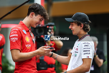 2024-09-19 - BEARMAN Oliver, Ferrari Driver Academy, portrait KIMI ANTONELLI Andrea (ita), Junior Driver of Mercedes AMG F1 Team, portrait during the Formula 1 Singapore Grand Prix 2024, 18th round of the 2024 Formula One World Championship from September 20 to 22, 2024 on the Marina Bay Circuit, in Singapore, Singapore - F1 - SINGAPORE GRAND PRIX 2024 - FORMULA 1 - MOTORS