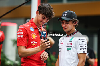 2024-09-19 - BEARMAN Oliver, Ferrari Driver Academy, portrait KIMI ANTONELLI Andrea (ita), Junior Driver of Mercedes AMG F1 Team, portrait during the Formula 1 Singapore Grand Prix 2024, 18th round of the 2024 Formula One World Championship from September 20 to 22, 2024 on the Marina Bay Circuit, in Singapore, Singapore - F1 - SINGAPORE GRAND PRIX 2024 - FORMULA 1 - MOTORS