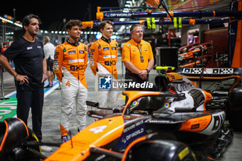 2024-09-19 - OKX Chief Marketing Officer Haider Rafique, NORRIS Lando (gbr), McLaren F1 Team MCL38, portrait PIASTRI Oscar (aus), McLaren F1 Team MCL38, portrait BROWN Zak (usa), CEO of of McLaren Racing, portrait during the Formula 1 Singapore Grand Prix 2024, 18th round of the 2024 Formula One World Championship from September 20 to 22, 2024 on the Marina Bay Circuit, in Singapore, Singapore - F1 - SINGAPORE GRAND PRIX 2024 - FORMULA 1 - MOTORS