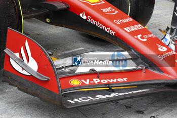 2024-09-20 - Scuderia Ferrari SF-24, mechanical detail Revised 3rd and 4th element spanwise loading distribution, updated tip details during the Formula 1 Singapore Grand Prix 2024, 18th round of the 2024 Formula One World Championship from September 20 to 22, 2024 on the Marina Bay Circuit, in Singapore, Singapore - F1 - SINGAPORE GRAND PRIX 2024 - FORMULA 1 - MOTORS