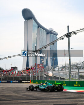 2024-09-20 - 14 ALONSO Fernando (spa), Aston Martin F1 Team AMR24, action during the Formula 1 Singapore Grand Prix 2024, 18th round of the 2024 Formula One World Championship from September 20 to 22, 2024 on the Marina Bay Circuit, in Singapore, Singapore - F1 - SINGAPORE GRAND PRIX 2024 - FORMULA 1 - MOTORS