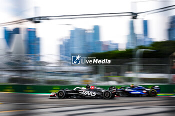 2024-09-20 - 20 MAGNUSSEN Kevin (den), Haas F1 Team VF-24 Ferrari, action during the Formula 1 Singapore Grand Prix 2024, 18th round of the 2024 Formula One World Championship from September 20 to 22, 2024 on the Marina Bay Circuit, in Singapore, Singapore - F1 - SINGAPORE GRAND PRIX 2024 - FORMULA 1 - MOTORS