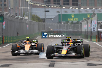 2024-09-20 - 11 PEREZ Sergio (mex), Red Bull Racing RB20, action 04 NORRIS Lando (gbr), McLaren F1 Team MCL38, action during the Formula 1 Singapore Grand Prix 2024, 18th round of the 2024 Formula One World Championship from September 20 to 22, 2024 on the Marina Bay Circuit, in Singapore, Singapore - F1 - SINGAPORE GRAND PRIX 2024 - FORMULA 1 - MOTORS