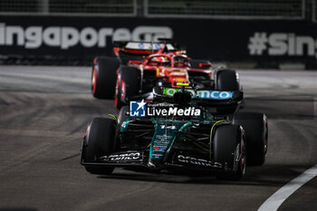 2024-09-20 - 14 ALONSO Fernando (spa), Aston Martin F1 Team AMR24, action during the Formula 1 Singapore Grand Prix 2024, 18th round of the 2024 Formula One World Championship from September 20 to 22, 2024 on the Marina Bay Circuit, in Singapore, Singapore - F1 - SINGAPORE GRAND PRIX 2024 - FORMULA 1 - MOTORS