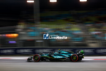 2024-09-20 - 14 ALONSO Fernando (spa), Aston Martin F1 Team AMR24, action during the Formula 1 Singapore Grand Prix 2024, 18th round of the 2024 Formula One World Championship from September 20 to 22, 2024 on the Marina Bay Circuit, in Singapore, Singapore - F1 - SINGAPORE GRAND PRIX 2024 - FORMULA 1 - MOTORS