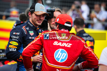 2024-10-19 - SAINZ Carlos (spa), Scuderia Ferrari SF-24, VERSTAPPEN Max (ned), Red Bull Racing RB20, portrait during the Formula 1 Pirelli United States Grand Prix 2024, 19th round of the 2024 Formula One World Championship from October 18 to 20, 2024 on the Circuit of the Americas, in Austin, United States of America - F1 - US GRAND PRIX 2024 - FORMULA 1 - MOTORS