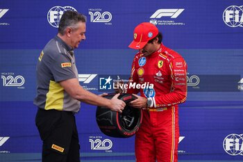 27/10/2024 - SAINZ Carlos (spa), Scuderia Ferrari SF-24, portrait and ISOLA Mario (ita), Motorsport Racing Manager of Pirelli, portrait during the Formula 1 Gran Premio de la Ciudad de Mexico 2024, 20th round of the 2024 Formula One World Championship from October 25 to 27, 2024 on the Autodromo Hermanos Rodriguez, in Mexico City, Mexico - F1 - MEXICO CITY GRAND PRIX 2024 - FORMULA 1 - MOTORI