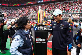 27/10/2024 - PEREZ Sergio (mex), Red Bull Racing RB20, portrait and Trophy Marshal award during the Formula 1 Gran Premio de la Ciudad de Mexico 2024, 20th round of the 2024 Formula One World Championship from October 25 to 27, 2024 on the Autodromo Hermanos Rodriguez, in Mexico City, Mexico - F1 - MEXICO CITY GRAND PRIX 2024 - FORMULA 1 - MOTORI