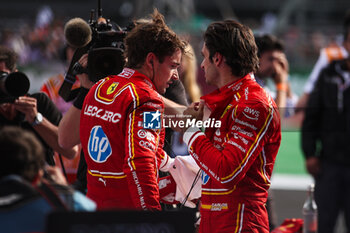 27/10/2024 - LECLERC Charles (mco), Scuderia Ferrari SF-24, portrait and SAINZ Carlos (spa), Scuderia Ferrari SF-24, portrait celebration during the Formula 1 Gran Premio de la Ciudad de Mexico 2024, 20th round of the 2024 Formula One World Championship from October 25 to 27, 2024 on the Autodromo Hermanos Rodriguez, in Mexico City, Mexico - F1 - MEXICO CITY GRAND PRIX 2024 - FORMULA 1 - MOTORI