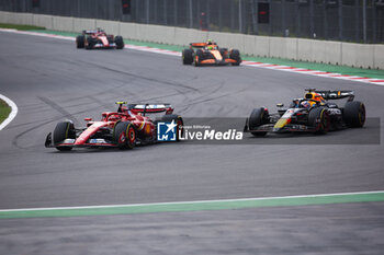 27/10/2024 - 55 SAINZ Carlos (spa), Scuderia Ferrari SF-24, action and 01 VERSTAPPEN Max (nld), Red Bull Racing RB20, action during the Formula 1 Gran Premio de la Ciudad de Mexico 2024, 20th round of the 2024 Formula One World Championship from October 25 to 27, 2024 on the Autodromo Hermanos Rodriguez, in Mexico City, Mexico - F1 - MEXICO CITY GRAND PRIX 2024 - FORMULA 1 - MOTORI