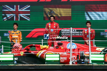 2024-10-28 - NORRIS Lando (gbr), McLaren F1 Team MCL38, portrait, LECLERC Charles (mco), Scuderia Ferrari SF-24, portrait and SAINZ Carlos (spa), Scuderia Ferrari SF-24, portrait podium celebration during the Formula 1 Gran Premio de la Ciudad de Mexico during the Formula 1 Gran Premio de la Ciudad de Mexico 2024, 20th round of the 2024 Formula One World Championship from October 25 to 27, 2024 on the Autodromo Hermanos Rodriguez, in Mexico City, Mexico - F1 - MEXICO CITY GRAND PRIX 2024 - FORMULA 1 - MOTORS