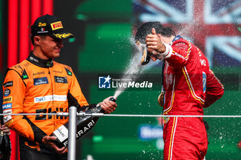 2024-10-28 - NORRIS Lando (gbr), McLaren F1 Team MCL38, portrait and SAINZ Carlos (spa), Scuderia Ferrari SF-24, portrait podium celebration during the Formula 1 Gran Premio de la Ciudad de Mexico 2024, 20th round of the 2024 Formula One World Championship from October 25 to 27, 2024 on the Autodromo Hermanos Rodriguez, in Mexico City, Mexico - F1 - MEXICO CITY GRAND PRIX 2024 - FORMULA 1 - MOTORS