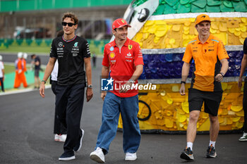 31/10/2024 - RUSSELL George (gbr), Mercedes AMG F1 Team W15, portrait LECLERC Charles (mco), Scuderia Ferrari SF-24, portrait PIASTRI Oscar (aus), McLaren F1 Team MCL38, portrait at Senna Tribute with gigant replica Senna helmet, casque, created by local artists working with Sebastian Vettel and Senna Foundation during the Formula 1 Grande Premio de Sao Paulo 2024, 21th round of the 2024 Formula One World Championship from November 1 to 3, 2024 on the Interlagos Circuit, in Sao Paulo, Brazil - F1 - SAO PAULO GRAND PRIX 2024 - FORMULA 1 - MOTORI