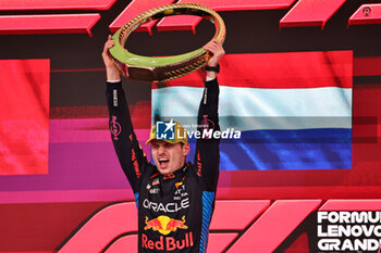 2024-11-03 - Max Verstappen (NED) - Oracle Red Bull Racing - Red Bull RB20 - Honda RBPT on the podium after the Formula 1 Lenovo Grande Premio de Sao Paulo 2024, scheduled to take place at Interlagos Circuit, San Paolo, Brasil, BRA  Nov 1st-3rd, 2024 - FORMULA 1 LENOVO GRANDE PREMIO DE SAO PAULO 2024 - RACE - FORMULA 1 - MOTORS