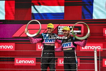 2024-11-03 - Esteban Ocon (FRA)  Pierre Gasly (FRA) - Alpine F1 Team - Alpine A524 - Renault on the podium after the Formula 1 Lenovo Grande Premio de Sao Paulo 2024, scheduled to take place at Interlagos Circuit, San Paolo, Brasil, BRA  Nov 1st-3rd, 2024 - FORMULA 1 LENOVO GRANDE PREMIO DE SAO PAULO 2024 - RACE - FORMULA 1 - MOTORS