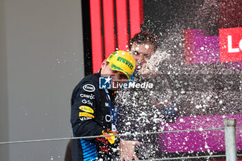 2024-11-03 - Max Verstappen (NED) - Oracle Red Bull Racing - Red Bull RB20 - Honda RBPT on the podium ofter the Formula 1 Lenovo Grande Premio de Sao Paulo 2024, scheduled to take place at Interlagos Circuit, San Paolo, Brasil, BRA  Nov 1st-3rd, 2024 - FORMULA 1 LENOVO GRANDE PREMIO DE SAO PAULO 2024 - RACE - FORMULA 1 - MOTORS