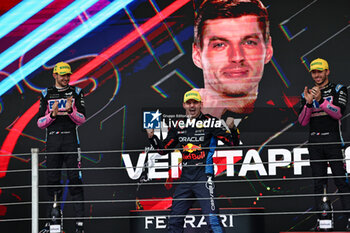 2024-11-03 - Max Verstappen (NED) - Oracle Red Bull Racing - Red Bull RB20 - Honda RBPT on the podium after the Formula 1 Lenovo Grande Premio de Sao Paulo 2024, scheduled to take place at Interlagos Circuit, San Paolo, Brasil, BRA  Nov 1st-3rd, 2024 - FORMULA 1 LENOVO GRANDE PREMIO DE SAO PAULO 2024 - RACE - FORMULA 1 - MOTORS