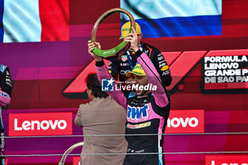 2024-11-03 - Pierre Gasly (FRA) - Alpine F1 Team - Alpine A524 - Renault on the podium after the Formula 1 Lenovo Grande Premio de Sao Paulo 2024, scheduled to take place at Interlagos Circuit, San Paolo, Brasil, BRA  Nov 1st-3rd, 2024 - FORMULA 1 LENOVO GRANDE PREMIO DE SAO PAULO 2024 - RACE - FORMULA 1 - MOTORS