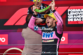 2024-11-03 - Pierre Gasly (FRA) - Alpine F1 Team - Alpine A524 - Renault on the podium after the Formula 1 Lenovo Grande Premio de Sao Paulo 2024, scheduled to take place at Interlagos Circuit, San Paolo, Brasil, BRA  Nov 1st-3rd, 2024 - FORMULA 1 LENOVO GRANDE PREMIO DE SAO PAULO 2024 - RACE - FORMULA 1 - MOTORS