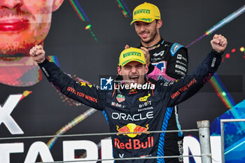 2024-11-03 - Max Verstappen (NED) - Oracle Red Bull Racing - Red Bull RB20 - Honda RBPT on the podium after the Formula 1 Lenovo Grande Premio de Sao Paulo 2024, scheduled to take place at Interlagos Circuit, San Paolo, Brasil, BRA  Nov 1st-3rd, 2024 - FORMULA 1 LENOVO GRANDE PREMIO DE SAO PAULO 2024 - RACE - FORMULA 1 - MOTORS