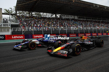 02/11/2024 - 30 LAWSON Liam (nzl), Visa Cash App RB F1 Team VCARB 01, action 11 PEREZ Sergio (mex), Red Bull Racing RB20, action during the Formula 1 Grande Premio de Sao Paulo 2024, 21th round of the 2024 Formula One World Championship from November 1 to 3, 2024 on the Interlagos Circuit, in Sao Paulo, Brazil - F1 - SAO PAULO GRAND PRIX 2024 - FORMULA 1 - MOTORI