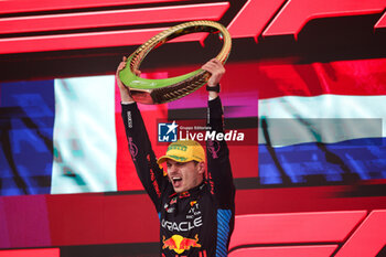 03/11/2024 - VERSTAPPEN Max (ned), Red Bull Racing RB20, portrait celebrates his victory podium trophy during the Formula 1 Grande Premio de Sao Paulo 2024, 21th round of the 2024 Formula One World Championship from November 1 to 3, 2024 on the Interlagos Circuit, in Sao Paulo, Brazil - F1 - SAO PAULO GRAND PRIX 2024 - FORMULA 1 - MOTORI