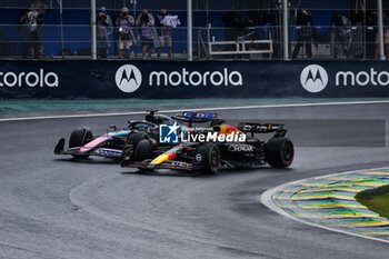 03/11/2024 - 01 VERSTAPPEN Max (nld), Red Bull Racing RB20, 31 OCON Esteban (fra), Alpine F1 Team A524, action during the Formula 1 Grande Premio de Sao Paulo 2024, 21th round of the 2024 Formula One World Championship from November 1 to 3, 2024 on the Interlagos Circuit, in Sao Paulo, Brazil - F1 - SAO PAULO GRAND PRIX 2024 - FORMULA 1 - MOTORI