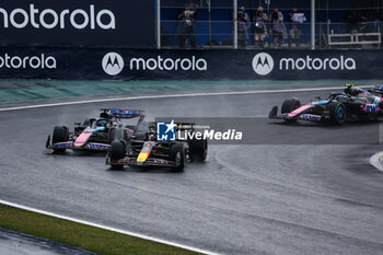 03/11/2024 - 01 VERSTAPPEN Max (nld), Red Bull Racing RB20, 31 OCON Esteban (fra), Alpine F1 Team A524, action during the Formula 1 Grande Premio de Sao Paulo 2024, 21th round of the 2024 Formula One World Championship from November 1 to 3, 2024 on the Interlagos Circuit, in Sao Paulo, Brazil - F1 - SAO PAULO GRAND PRIX 2024 - FORMULA 1 - MOTORI