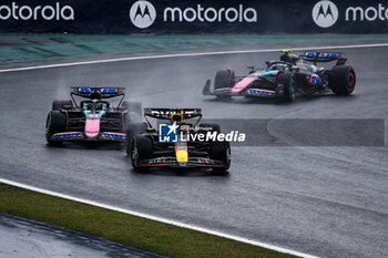 03/11/2024 - 01 VERSTAPPEN Max (nld), Red Bull Racing RB20, 31 OCON Esteban (fra), Alpine F1 Team A524, action during the Formula 1 Grande Premio de Sao Paulo 2024, 21th round of the 2024 Formula One World Championship from November 1 to 3, 2024 on the Interlagos Circuit, in Sao Paulo, Brazil - F1 - SAO PAULO GRAND PRIX 2024 - FORMULA 1 - MOTORI