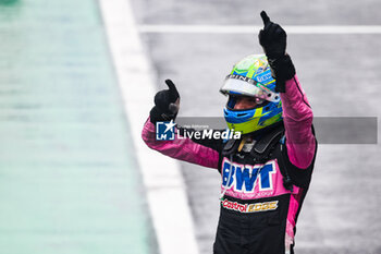 03/11/2024 - OCON Esteban (fra), Alpine F1 Team A524, portrait celebrating podium during the Formula 1 Grande Premio de Sao Paulo 2024, 21th round of the 2024 Formula One World Championship from November 1 to 3, 2024 on the Interlagos Circuit, in Sao Paulo, Brazil - F1 - SAO PAULO GRAND PRIX 2024 - FORMULA 1 - MOTORI