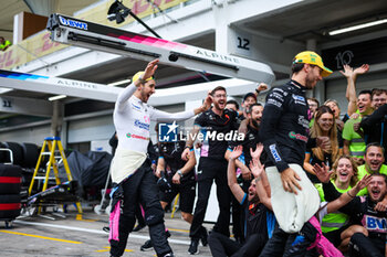 03/11/2024 - GASLY Pierre (fra), Alpine F1 Team A524, and OCON Esteban (fra), Alpine F1 Team A524, portrait celebrating podium with the team during the Formula 1 Grande Premio de Sao Paulo 2024, 21th round of the 2024 Formula One World Championship from November 1 to 3, 2024 on the Interlagos Circuit, in Sao Paulo, Brazil - F1 - SAO PAULO GRAND PRIX 2024 - FORMULA 1 - MOTORI