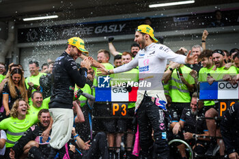 03/11/2024 - GASLY Pierre (fra), Alpine F1 Team A524, and OCON Esteban (fra), Alpine F1 Team A524, portrait celebrating podium with the team during the Formula 1 Grande Premio de Sao Paulo 2024, 21th round of the 2024 Formula One World Championship from November 1 to 3, 2024 on the Interlagos Circuit, in Sao Paulo, Brazil - F1 - SAO PAULO GRAND PRIX 2024 - FORMULA 1 - MOTORI