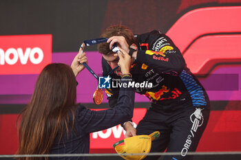 03/11/2024 - VERSTAPPEN Max (ned), Red Bull Racing RB20, portrait podium celebrates victory Fabiana Ecclestone portrait during the Formula 1 Grande Premio de Sao Paulo 2024, 21th round of the 2024 Formula One World Championship from November 1 to 3, 2024 on the Interlagos Circuit, in Sao Paulo, Brazil - F1 - SAO PAULO GRAND PRIX 2024 - FORMULA 1 - MOTORI