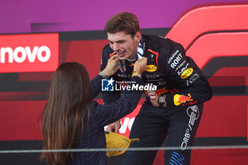 03/11/2024 - VERSTAPPEN Max (ned), Red Bull Racing RB20, portrait podium celebrates victory Fabiana Ecclestone portrait during the Formula 1 Grande Premio de Sao Paulo 2024, 21th round of the 2024 Formula One World Championship from November 1 to 3, 2024 on the Interlagos Circuit, in Sao Paulo, Brazil - F1 - SAO PAULO GRAND PRIX 2024 - FORMULA 1 - MOTORI