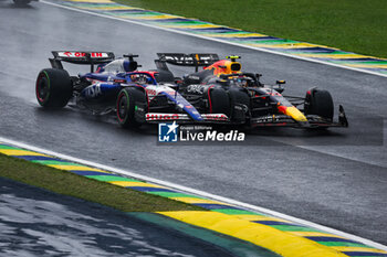 03/11/2024 - 30 LAWSON Liam (nzl), Visa Cash App RB F1 Team VCARB 01, 11 PEREZ Sergio (mex), Red Bull Racing RB20, action during the Formula 1 Grande Premio de Sao Paulo 2024, 21th round of the 2024 Formula One World Championship from November 1 to 3, 2024 on the Interlagos Circuit, in Sao Paulo, Brazil - F1 - SAO PAULO GRAND PRIX 2024 - FORMULA 1 - MOTORI