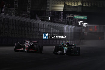 2024-11-22 - 20 MAGNUSSEN Kevin (den), Haas F1 Team VF-24 Ferrari, action 44 HAMILTON Lewis (gbr), Mercedes AMG F1 Team W15, action during the Formula 1 Heineken Silver Las Vegas Grand Prix 2024, 22th round of the 2024 Formula One World Championship from November 21 to 23, 2024 on the Las Vegas Strip Circuit, in Las Vegas, United States of America - F1 - LAS VEGAS GRAND PRIX 2024 - FORMULA 1 - MOTORS