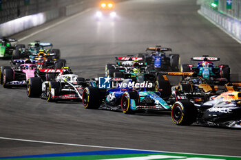 2024-11-24 - Start 22 TSUNODA Yuki (jap), Visa Cash App RB F1 Team VCARB 01, action 27 HULKENBERG Nico (ger), Haas F1 Team VF-24 Ferrari, action during the Formula 1 Heineken Silver Las Vegas Grand Prix 2024, 22th round of the 2024 Formula One World Championship from November 21 to 23, 2024 on the Las Vegas Strip Circuit, in Las Vegas, United States of America - F1 - LAS VEGAS GRAND PRIX 2024 - FORMULA 1 - MOTORS