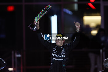 2024-11-24 - RUSSELL George (gbr), Mercedes AMG F1 Team W15, portrait celebrates his victory podium during the Formula 1 Heineken Silver Las Vegas Grand Prix 2024, 22th round of the 2024 Formula One World Championship from November 21 to 23, 2024 on the Las Vegas Strip Circuit, in Las Vegas, United States of America - F1 - LAS VEGAS GRAND PRIX 2024 - FORMULA 1 - MOTORS