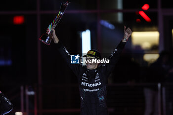 2024-11-24 - RUSSELL George (gbr), Mercedes AMG F1 Team W15, portrait celebrates his victory podium during the Formula 1 Heineken Silver Las Vegas Grand Prix 2024, 22th round of the 2024 Formula One World Championship from November 21 to 23, 2024 on the Las Vegas Strip Circuit, in Las Vegas, United States of America - F1 - LAS VEGAS GRAND PRIX 2024 - FORMULA 1 - MOTORS