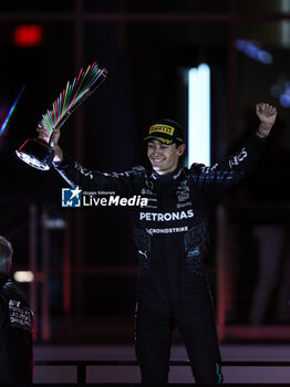 2024-11-24 - RUSSELL George (gbr), Mercedes AMG F1 Team W15, portrait celebrates his victory podium during the Formula 1 Heineken Silver Las Vegas Grand Prix 2024, 22th round of the 2024 Formula One World Championship from November 21 to 23, 2024 on the Las Vegas Strip Circuit, in Las Vegas, United States of America - F1 - LAS VEGAS GRAND PRIX 2024 - FORMULA 1 - MOTORS