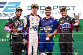 2024-07-20 - VERSCHOOR Richard (nld), Trident, Dallara F2 2024, MAINI Kush (ind), Invicta Racing, Dallara F2 2024, MARTINS Victor (fra), ART Grand Prix, Dallara F2 2024, portrait, podium during the 9th round of the 2024 FIA Formula 2 Championship from July 19 to 21, 2024 on the Hungaroring, in Mogyorod, Hungary - AUTO - FORMULA 2 2024 - HUNGARORING - FORMULA 2 - MOTORS