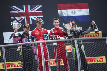 2024-08-31 - MARTINS Victor (fra), ART Grand Prix, Dallara F2 2024, portrait, BEARMAN Oliver (gbr), Prema Racing, Dallara F2 2024, portrait and DURKSEN Joshua (pry), PHM AIX Racing, Dallara F2 2024, portrait podium celebration during the 11th round of the 2024 FIA Formula 2 Championship from August 30 to September 1, 2024 on the Autodromo Nazionale Monza, in Monza, Italy - AUTO - FORMULA 2 2024 - MONZA - FORMULA 2 - MOTORS