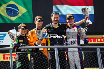 2024-09-01 - BORTOLETO Gabriel (bra), Invicta Racing, Dallara F2 2024, portrait MALONY Zane (bar), Rodin Motorsport, Dallara F2 2024, portrait VERSCHOOR Richard (nld), Trident, Dallara F2 2024, portrait podium during the 11th round of the 2024 FIA Formula 2 Championship from August 30 to September 1, 2024 on the Autodromo Nazionale Monza, in Monza, Italy - AUTO - FORMULA 2 2024 - MONZA - FORMULA 2 - MOTORS