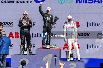 2024-04-13 - TAG Heuer Porsche Formula E Team (DEU) Porsche 99X Electric Antonio Felix Da Costa (PRT) DAC celebrates on the podium after winning the 2024 Misano E-Prix - MISANO ADRIATICO - ABB FIA FORMULA E WORLD CHAMPIONSHIP - FORMULA E - MOTORS