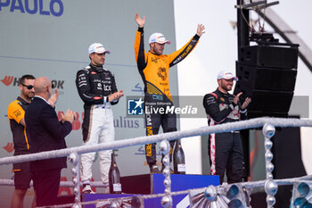 2024-03-16 - BIRD Sam (gbr), NEOM McLaren Formula E Team, Nissan e-4ORCE 04, portrait EVANS Mitch (nzl), Jaguar TCS Racing, Jaguar I-Type 6, portrait ROWLAND Oliver (gbr), Nissan Formula E Team, Nissan e-4ORCE 04, portrait at podium during the 2024 Sao Paulo ePrix, 3rd meeting of the 2023-24 ABB FIA Formula E World Championship, on the Sao Paulo Street Circuit from March 24 to 26, 2024 in Sao Paulo, Brazil - 2024 FORMULA E SAO PAULO EPRIX - FORMULA E - MOTORS