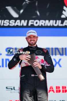 2024-05-12 - ROWLAND Oliver (gbr), Nissan Formula E Team, Nissan e-4ORCE 04, portrait at the podium during the 2024 Berlin ePrix, 7th meeting of the 2023-24 ABB FIA Formula E World Championship, on the Tempelhof Airport Street Circuit from May 10 to 12, 2024 in Berlin, Germany - 2024 FORMULA E BERLIN EPRIX - FORMULA E - MOTORS