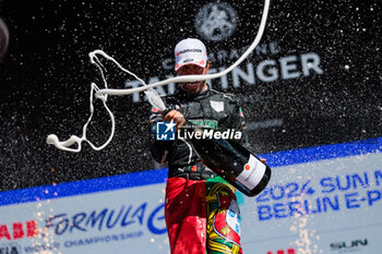 2024-05-12 - DA COSTA Antonio Felix (prt), TAG HEUER Porsche Formula E Team, Porsche 99X Electric, portrait at the podium during the 2024 Berlin ePrix, 7th meeting of the 2023-24 ABB FIA Formula E World Championship, on the Tempelhof Airport Street Circuit from May 10 to 12, 2024 in Berlin, Germany - 2024 FORMULA E BERLIN EPRIX - FORMULA E - MOTORS