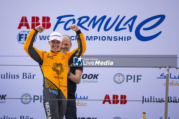 2024-05-26 - Podium, HUGHES Jake (gbr), NEOM McLaren Formula E Team, Nissan e-4ORCE 04, portrait during the 2024 Shanghai ePrix, 8th meeting of the 2023-24 ABB FIA Formula E World Championship, on the Shanghai International Circuit from May 24 to 26, 2024 in Shanghai, China - 2024 FORMULA E SHANGHAI EPRIX - FORMULA E - MOTORS